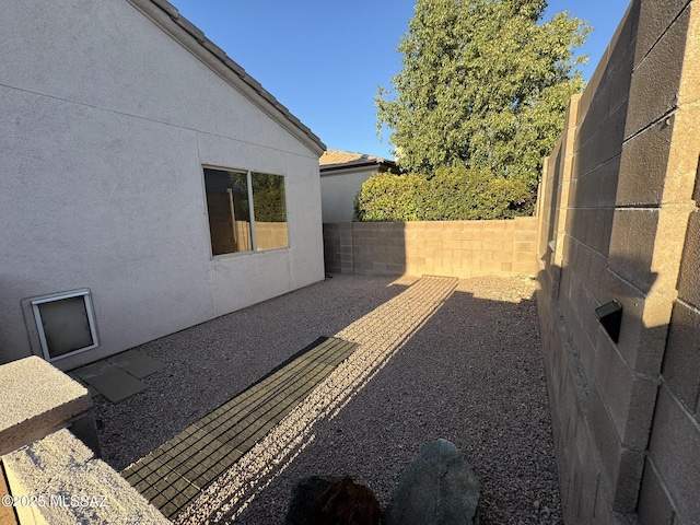 7456 E Placita Del Espiritu, Tucson, AZ 85715 - fenced backyard featuring a patio area