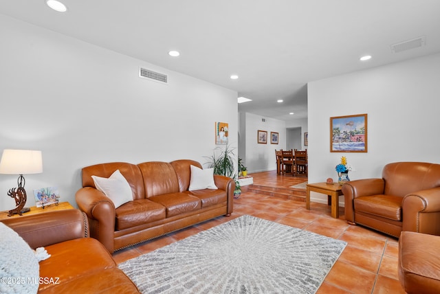 living area featuring visible vents, recessed lighting, and light tile patterned floors