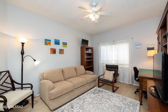 home office featuring light wood-style floors and ceiling fan