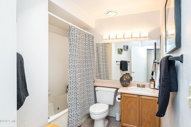 full bath featuring shower / bath combo, toilet, and vanity