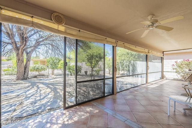 unfurnished sunroom featuring plenty of natural light