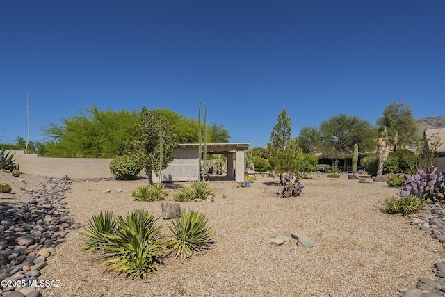 view of yard with fence