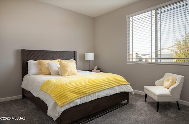 carpeted bedroom with baseboards