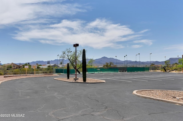 5273 W Fireopal Way, Tucson, AZ 85742 - exterior space with street lighting, a mountain view, and curbs