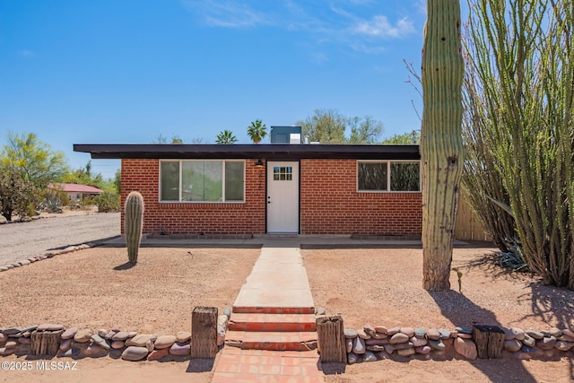 view of front of property with brick siding
