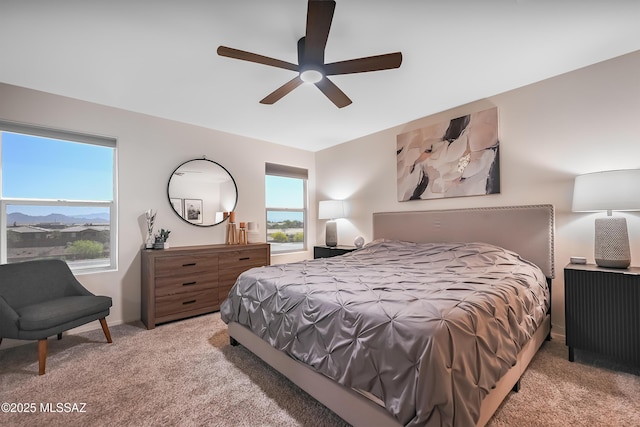 bedroom featuring carpet and a ceiling fan