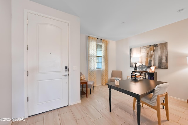 dining area featuring baseboards