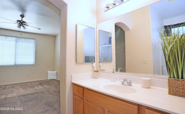 3581 W Avenida Vera Cruz, Tucson, AZ 85746 - bathroom with vanity and ceiling fan