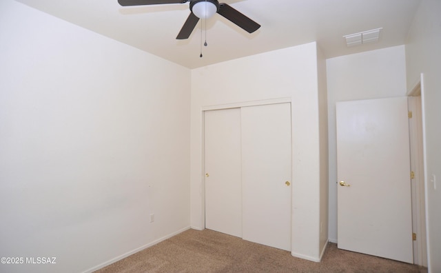 3581 W Avenida Vera Cruz, Tucson, AZ 85746 - unfurnished bedroom featuring carpet, a closet, and ceiling fan