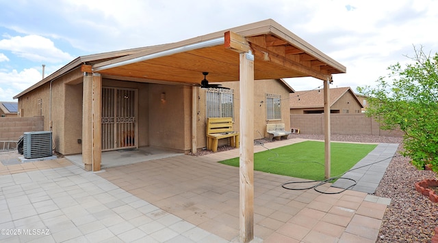 3581 W Avenida Vera Cruz, Tucson, AZ 85746 - fenced backyard featuring ceiling fan and a patio