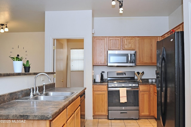 3581 W Avenida Vera Cruz, Tucson, AZ 85746 - kitchen featuring appliances with stainless steel finishes, light tile patterned floors, and dark countertops