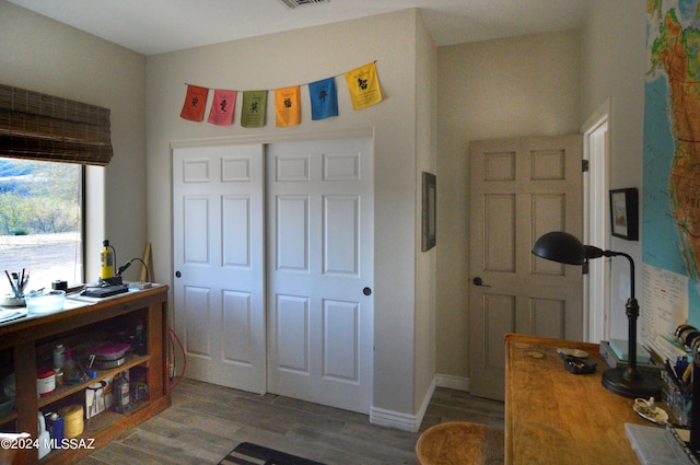 entrance foyer with visible vents and wood finished floors