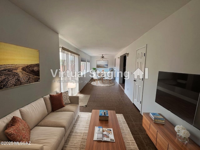 living area featuring dark tile patterned flooring