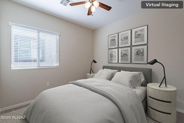 bedroom featuring carpet, visible vents, and baseboards