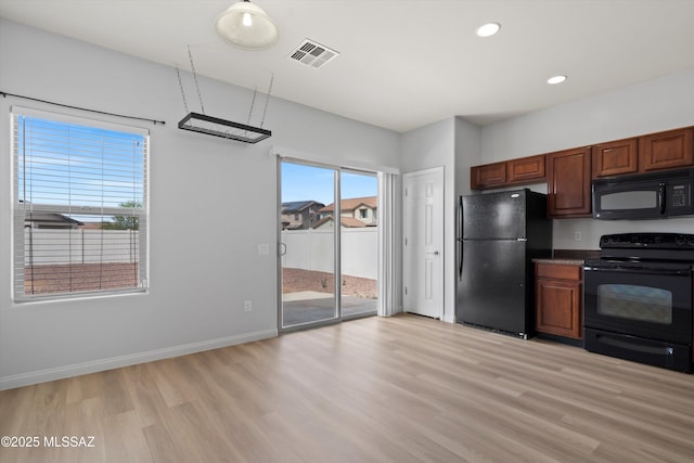 21700 E Governor Dr, Red Rock, AZ 85145 - kitchen featuring baseboards, recessed lighting, light wood-style floors, visible vents, and black appliances