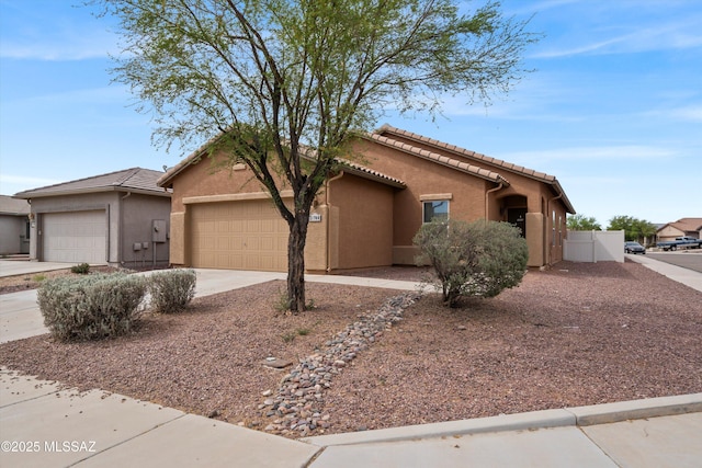 21700 E Governor Dr, Red Rock, AZ 85145 - ranch-style home featuring an attached garage, a tiled roof, driveway, and stucco siding