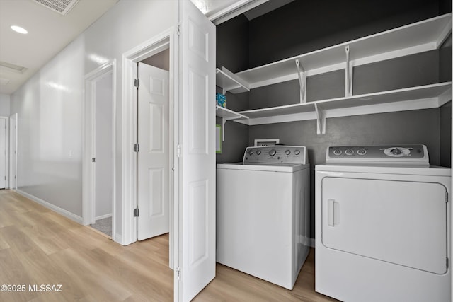 21700 E Governor Dr, Red Rock, AZ 85145 - washroom featuring laundry area, visible vents, recessed lighting, light wood finished floors, and washer and clothes dryer