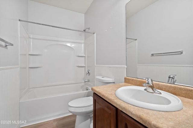 21700 E Governor Dr, Red Rock, AZ 85145 - bathroom with toilet, wood finished floors, vanity, and a wainscoted wall