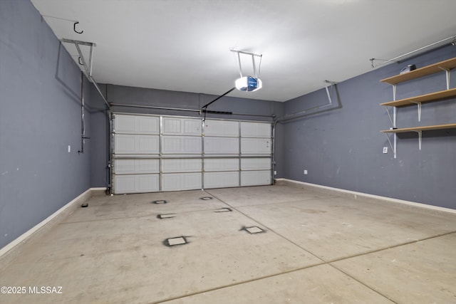 21700 E Governor Dr, Red Rock, AZ 85145 - garage with baseboards and a garage door opener