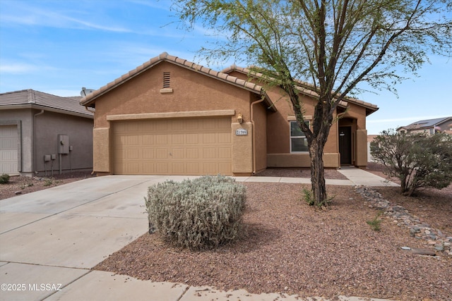 21700 E Governor Dr, Red Rock, AZ 85145 - ranch-style home with a garage, stucco siding, a tiled roof, and concrete driveway