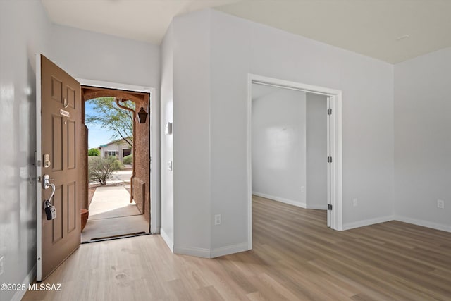 21700 E Governor Dr, Red Rock, AZ 85145 - foyer with baseboards and light wood finished floors