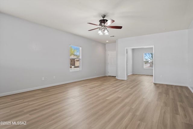21700 E Governor Dr, Red Rock, AZ 85145 - interior space featuring visible vents, light wood-style flooring, a ceiling fan, and baseboards