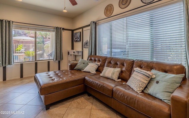 9125 S Crows Nest Ct, Tucson, AZ 85756 - living area with light tile patterned floors and a ceiling fan