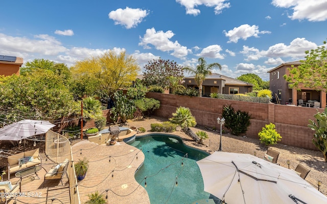 9125 S Crows Nest Ct, Tucson, AZ 85756 - view of swimming pool with a fenced backyard and a patio