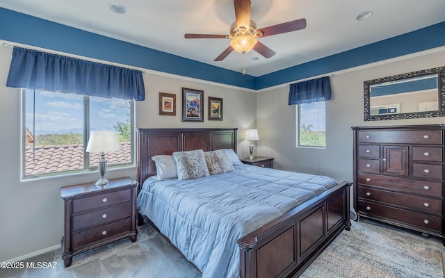 9125 S Crows Nest Ct, Tucson, AZ 85756 - bedroom with light carpet, ceiling fan, baseboards, and recessed lighting