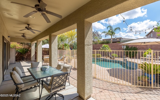 9125 S Crows Nest Ct, Tucson, AZ 85756 - fenced backyard with a patio area, outdoor dining space, and a ceiling fan
