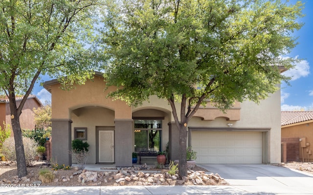 9125 S Crows Nest Ct, Tucson, AZ 85756 - view of front facade featuring driveway, stucco siding, and an attached garage