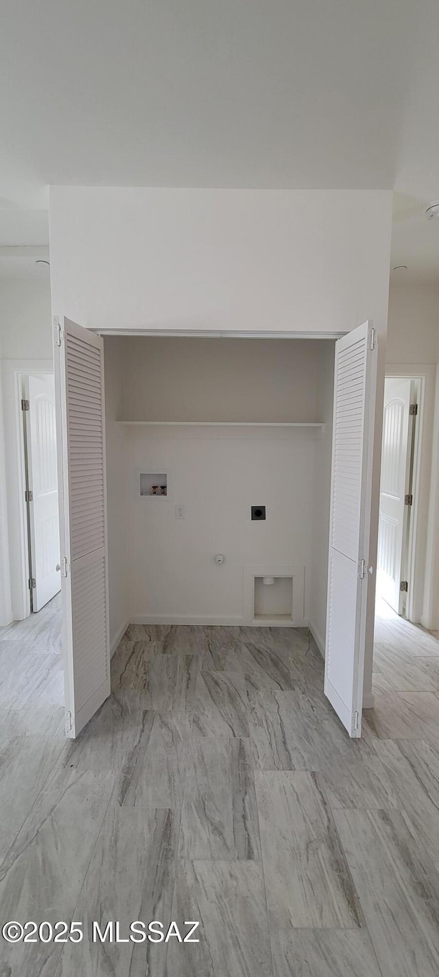 washroom with gas dryer hookup, marble finish floor, laundry area, and hookup for a washing machine