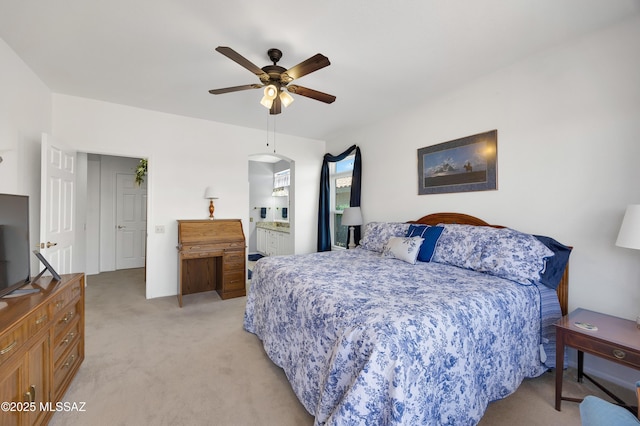 bedroom with ceiling fan and light colored carpet