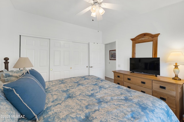 bedroom with a ceiling fan and a closet