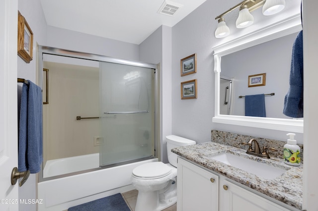 full bath with vanity, tile patterned floors, toilet, visible vents, and enclosed tub / shower combo