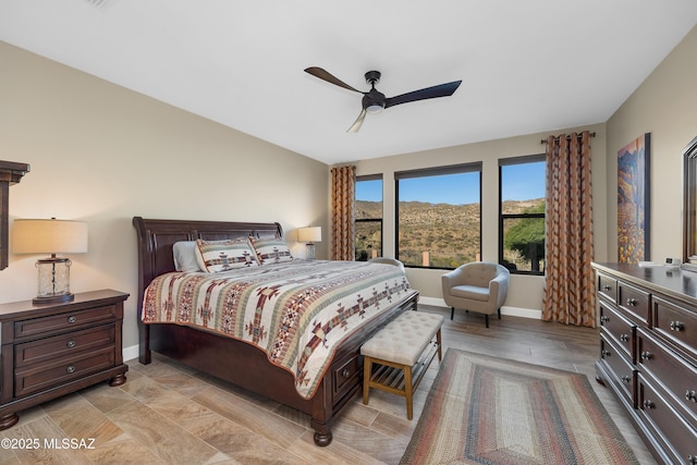 35605 S Overlook Dr, Saddlebrooke, AZ 85739 - bedroom featuring a ceiling fan and baseboards