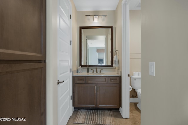 35605 S Overlook Dr, Saddlebrooke, AZ 85739 - bathroom with tile patterned floors, vanity, and toilet