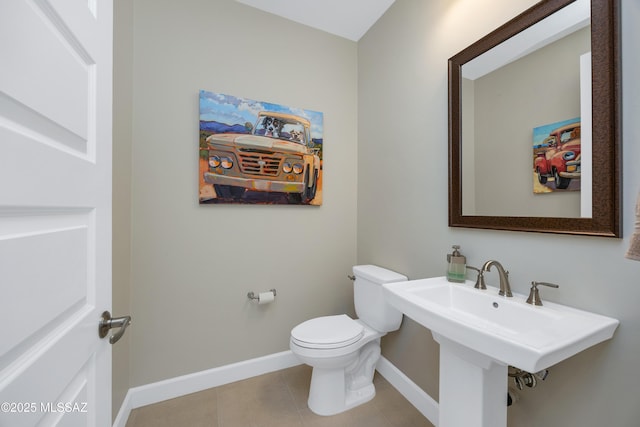 35605 S Overlook Dr, Saddlebrooke, AZ 85739 - bathroom with tile patterned floors, toilet, and baseboards