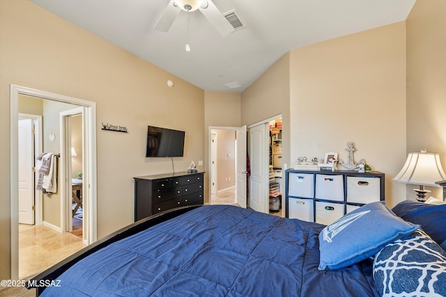 tiled bedroom with visible vents, a ceiling fan, and baseboards