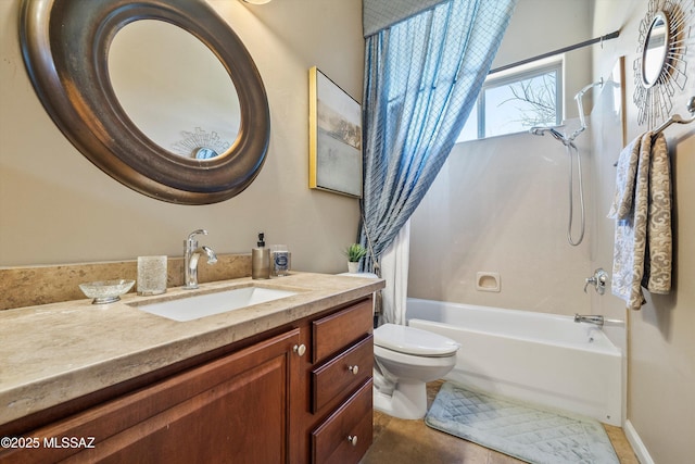 full bathroom with toilet, vanity, tile patterned floors, and  shower combination