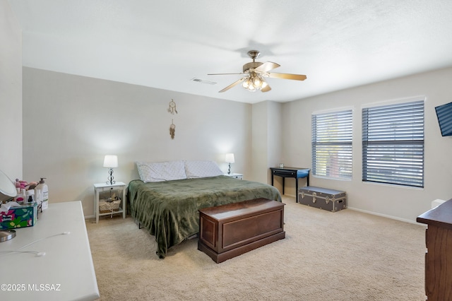 1985 S Mcconnell Dr, Tucson, AZ 85710 - bedroom featuring light carpet, ceiling fan, baseboards, and visible vents