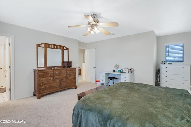 1985 S Mcconnell Dr, Tucson, AZ 85710 - bedroom featuring light carpet, visible vents, baseboards, and a ceiling fan