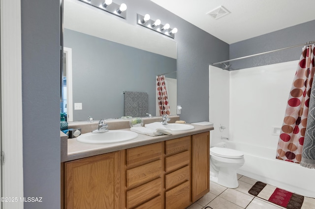 1985 S Mcconnell Dr, Tucson, AZ 85710 - full bath with a sink, visible vents, tile patterned flooring, and shower / bath combo