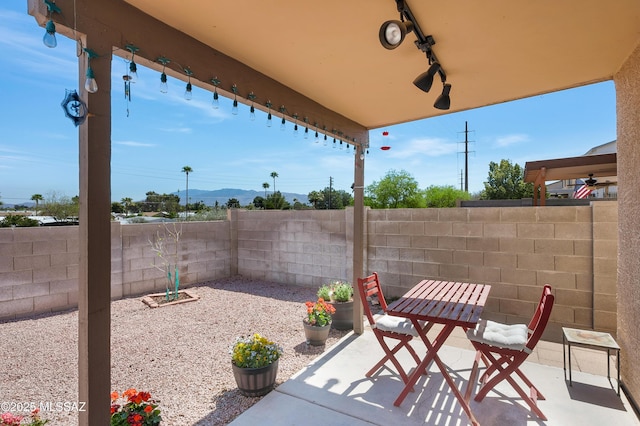 1985 S Mcconnell Dr, Tucson, AZ 85710 - view of patio / terrace with a fenced backyard