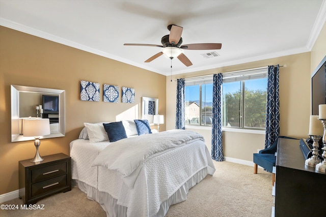 bedroom with baseboards, ornamental molding, light carpet, visible vents, and ceiling fan