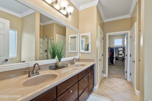 bathroom featuring a sink, a wealth of natural light, and a shower stall