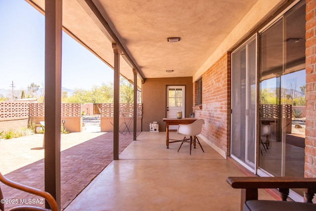 view of patio with fence
