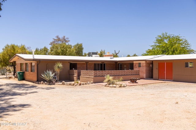 single story home with brick siding