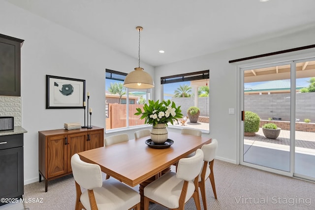 8972 E Mcmurray Pl, Tucson, AZ 85730 - dining area featuring light carpet, baseboards, and recessed lighting