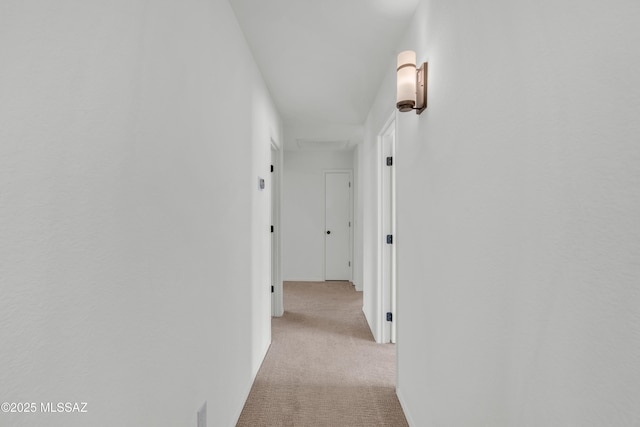 8972 E Mcmurray Pl, Tucson, AZ 85730 - hallway with light colored carpet